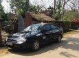 Kia Spectra 1.6 MT 2004 - Cần bán xe Kia Spectra 1.6 MT sản xuất 2004, màu đen