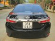 Toyota Corolla altis 1.8AT 2016 - Bán Toyota Corolla Altis 1.8AT đời 2016, màu đen xe gia đình, giá 680tr