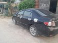 Toyota Corolla altis 1.8MT 2011 - Cần bán gấp Toyota Corolla Altis 1.8MT đời 2011, màu đen chính chủ, giá tốt