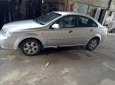 Daewoo Lacetti số sàn 2004 - Cần bán xe Daewoo Lacetti số sàn đời 2004, màu bạc