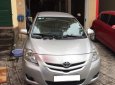 Toyota Vios E 2010 - Cần bán lại xe Toyota Vios E năm 2010, màu bạc số sàn