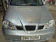 Daewoo Lacetti số sàn 2004 - Cần bán xe Daewoo Lacetti số sàn đời 2004, màu bạc