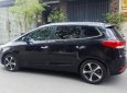 Kia Rondo DAT 2016 - Bán xe Kia Rondo DAT đời 2016, màu đen số tự động, giá chỉ 668 triệu