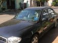 Kia Spectra 2005 - Bán xe Kia Spectra sản xuất năm 2005, màu đen, xe nhập, giá chỉ 130 triệu