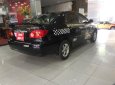 Toyota Corolla altis 2003 - Bán xe Toyota Corolla altis đời 2003, màu đỏ, số sàn, 285 triệu