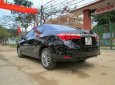 Toyota Corolla altis 1.8G AT 2016 - Bán Toyota Corolla altis 1.8G AT năm 2016, màu đen  