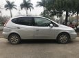 Chevrolet Vivant CDX MT 2009 - Chính chủ bán Chevrolet Vivant CDX đời 2009, màu bạc