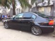 BMW 3 Series  318i 2003 - Bán BMW 3 Series 318i năm 2003, màu đen, nhập khẩu 