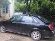 Daewoo Lacetti EX 1.6 MT 2004 - Bán xe Daewoo Lacetti EX 1.6 MT sản xuất 2004, màu đen