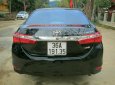 Toyota Corolla altis 1.8G AT 2016 - Bán Toyota Corolla altis 1.8G AT năm 2016, màu đen  