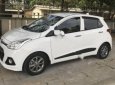 Hyundai Grand i10  1.2 AT 2015 - Cần bán gấp Hyundai Grand i10 1.2 AT đời 2015, màu trắng, nhập khẩu nguyên chiếc số tự động