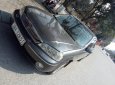 Ford Laser Ghia 1.8 MT 2003 - Bán Ford Laser Ghia 1.8 MT năm 2003, màu xám giá cạnh tranh