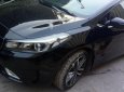 Kia Cerato 2.0 AT 2016 - Cần bán lại xe Kia Cerato 2.0 AT năm sản xuất 2016, màu đen như mới