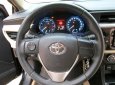Toyota Corolla altis 1.8AT 2016 - Cần bán lại xe Toyota Corolla Altis 1.8AT đời 2016, màu đen xe gia đình, giá tốt