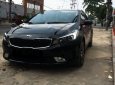 Kia Cerato 2.0 AT 2016 - Cần bán lại xe Kia Cerato 2.0 AT năm sản xuất 2016, màu đen như mới