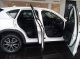 Mazda CX 5 2018 - Mazda Bình Tân cần bán xe CX-5 2.5L 2WD 2018 màu trắng, hỗ trợ vay 90%, xe giao ngay. Lh 0869919151 gặp Phúc Thịnh