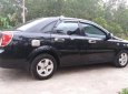 Chevrolet Lacetti EX 2013 - Bán xe Chevrolet Lacetti EX sản xuất 2013, màu đen còn mới, giá chỉ 285 triệu