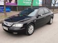 Ford Mondeo AT 2004 - Bán xe Ford Mondeo số tự động, sản xuất 2004 màu đen, giá tốt