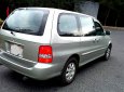 Kia Carnival 2009 - Cần bán Kia Carnival 2009, màu bạc chính chủ