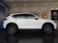 Mazda CX 5 2018 - Mazda Bình Tân cần bán xe CX-5 2.5L 2WD 2018 màu trắng, hỗ trợ vay 90%, xe giao ngay. Lh 0869919151 gặp Phúc Thịnh