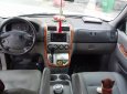 Kia Carnival 2009 - Cần bán Kia Carnival 2009, màu bạc chính chủ