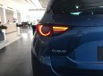 Mazda CX 5 2018 - Mazda Bình Tân cần bán xe CX-5 2.5L 2WD 2018 màu trắng, hỗ trợ vay 90%, xe giao ngay. Lh 0869919151 gặp Phúc Thịnh