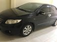 Toyota Corolla altis 1.8G MT 2010 - Bán xe Toyota Corolla Altis MT 2010, màu đen