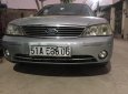 Ford Laser LXi 1.6 MT 2004 - Chính chủ bán Ford Laser LXi 1.6 MT đời 2004, màu bạc