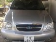 Kia Carnival 2005 - Bán Kia Carnival đời 2005, màu bạc