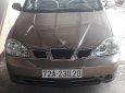 Daewoo Lacetti EX 1.6 MT 2004 - Chính chủ bán xe Daewoo Lacetti EX 1.6 MT đời 2004, màu vàng cát