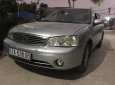 Ford Laser LXi 1.6 MT 2004 - Chính chủ bán Ford Laser LXi 1.6 MT đời 2004, màu bạc