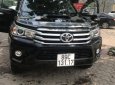 Toyota Hilux 3.0G AT 2016 - Bán Toyota Hilux 3.0G AT đời 2016, màu đen như mới