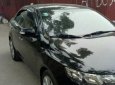 Kia Cerato 1.6 AT 2010 - Bán xe Kia Cerato 1.6 AT sản xuất 2010, màu đen, nhập khẩu