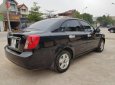 Daewoo Lacetti 2010 - Cần bán lại xe Daewoo Lacetti sản xuất 2010, màu đen