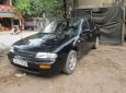 Nissan Bluebird 1999 - Cần bán xe Nissan Bluebird 1999, màu đen