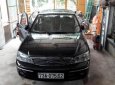 Ford Laser GHIA 1.8 AT 2005 - Bán xe Ford Laser GHIA 1.8 AT đời 2005, màu đen 