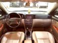 Toyota Corolla altis 1.8G 2003 - Bán Toyota Corolla altis 1.8G sản xuất năm 2003, màu đen số sàn, 255tr