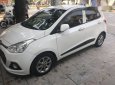 Hyundai Grand i10 2015 - Chính chủ bán Hyundai Grand i10 đời 2015, màu trắng