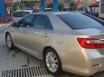 Toyota Camry 2013 - Bán Toyota Camry năm 2013, màu vàng