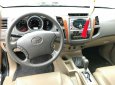 Toyota Fortuner 2010 - Cần bán lại xe Toyota Fortuner màu đen xe gia đình, 568tr