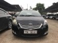 Toyota Vios E 2009 - Cần bán gấp Toyota Vios E 2009, màu đen