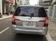 Toyota Innova 2.0E 2014 - Cần bán gấp Toyota Innova 2.0E năm 2014, màu bạc