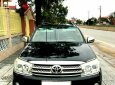 Toyota Fortuner 2010 - Cần bán lại xe Toyota Fortuner màu đen xe gia đình, 568tr