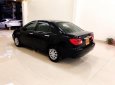 Toyota Corolla altis 1.8G 2003 - Bán Toyota Corolla altis 1.8G sản xuất năm 2003, màu đen số sàn, 255tr