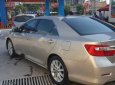 Toyota Camry 2013 - Bán Toyota Camry năm 2013, màu vàng