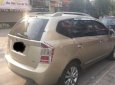 Kia Carens EX 2.0 MT 2010 - Cần bán Kia Carens EX 2.0 MT sản xuất năm 2010, màu vàng số sàn, 318 triệu