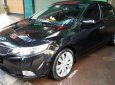 Kia Cerato 1.6 AT 2011 - Cần bán lại xe Kia Cerato 1.6 AT sản xuất năm 2011, màu đen, nhập khẩu chính chủ