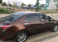 Toyota Corolla altis 1.8G AT 2016 - Bán xe Toyota Corolla altis 1.8G AT đời 2016, màu nâu số tự động giá cạnh tranh