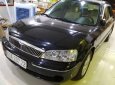 Ford Laser   2003 - Bán gấp Ford Laser đời 2003, màu đen