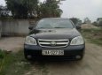 Daewoo Lacetti 2004 - Bán xe Daewoo Lacetti đời 2004, màu đen xe gia đình